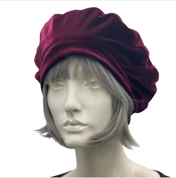 Beret and infinity scarf handmade in wine color fleece shown modeled on a hat mannequin